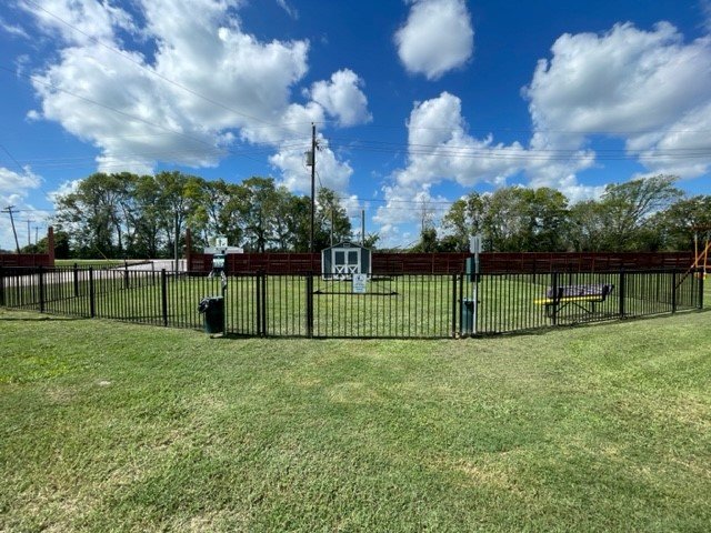 Fenced dog park at Angleton RV Park & Resort